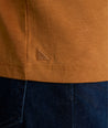Model is wearing UNTUCKit Marastina LS Tencel Henley in Roasted Pecan.