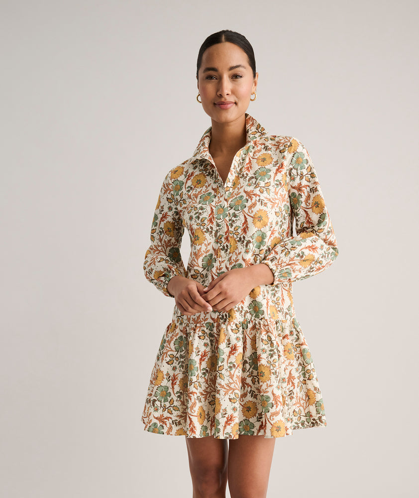 Model is wearing UNTUCKit printed Maren dress.
