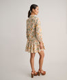 Model is wearing UNTUCKit printed Maren dress.