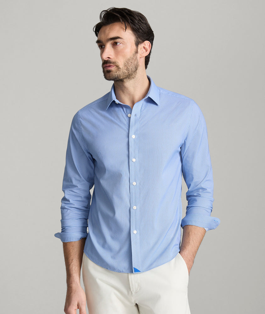 Model is wearing Marlowe performance shirt. 