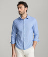 Model is wearing Marlowe performance shirt. 