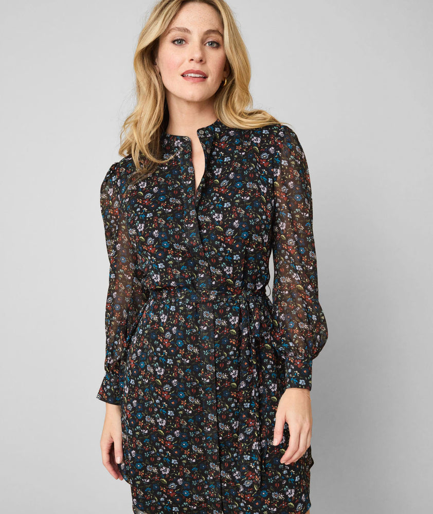Model is wearing UNTUCKit Marnie dress in floral.