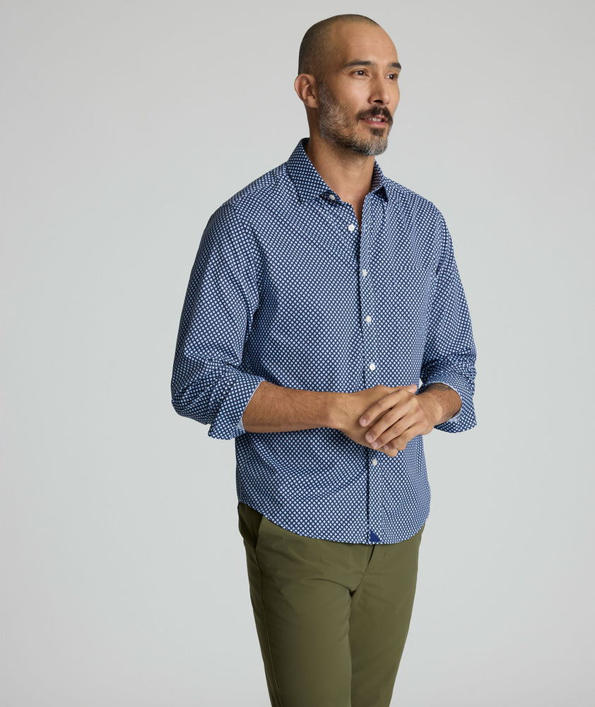 Model is wearing UNTUCKit Marshall performance shirt. 