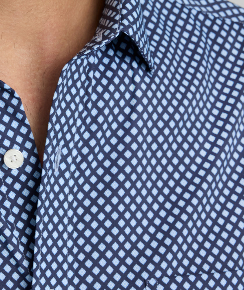 Model is wearing UNTUCKit Marshall performance shirt. 