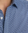 Model is wearing UNTUCKit Marshall performance shirt. 