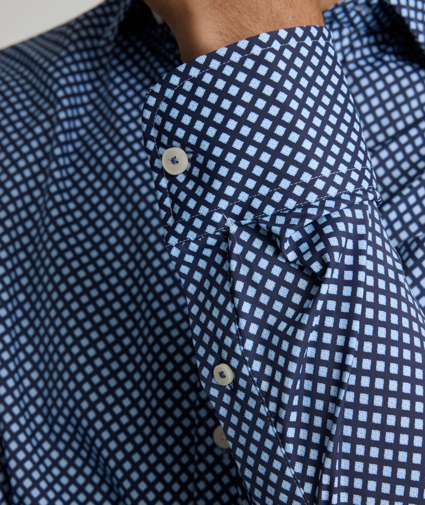 Model is wearing UNTUCKit Marshall performance shirt. 