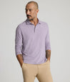 Model is wearing UNTUCKit Martinez Stripe Polo in Montana Grape.