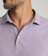 Model is wearing UNTUCKit Martinez Stripe Polo in Montana Grape.
