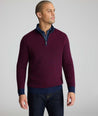 Model is wearing UNTUCKit Textured Merino Wool Quarter-Zips in syrah.