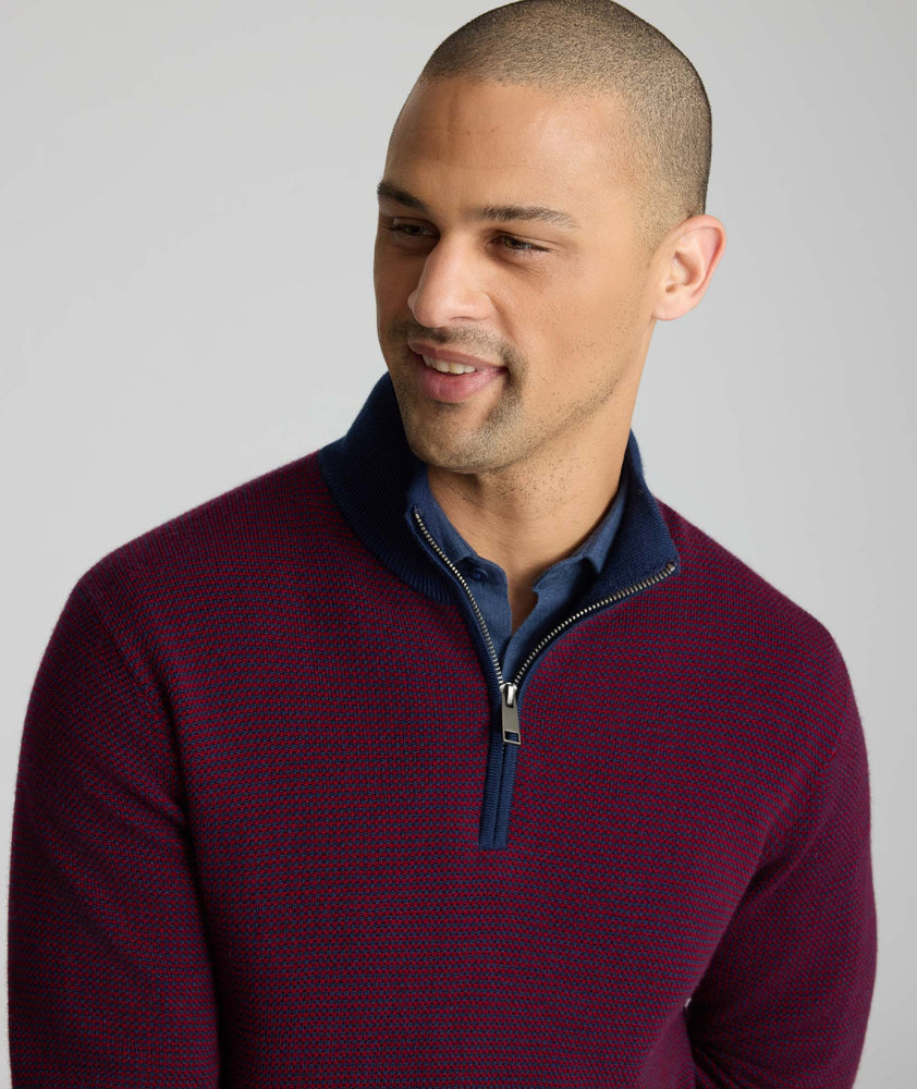 Model is wearing UNTUCKit Textured Merino Wool Quarter-Zips in syrah.