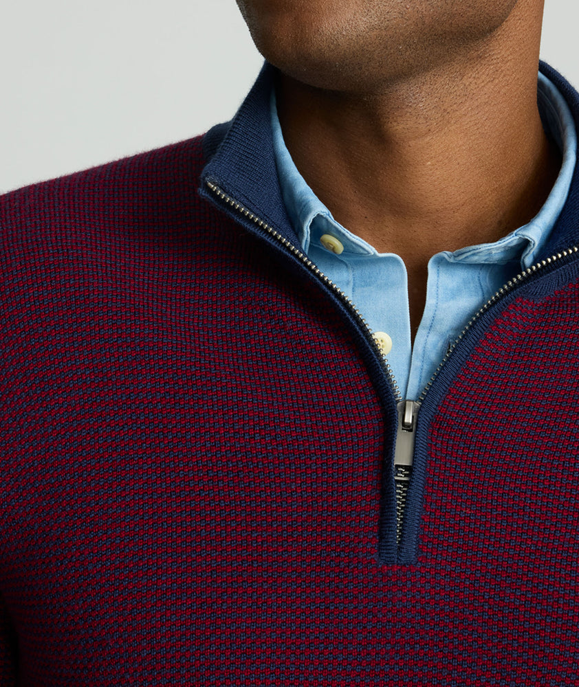 Model is wearing UNTUCKit Textured Merino Wool Quarter-Zips in syrah. 
