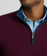 Model is wearing UNTUCKit Textured Merino Wool Quarter-Zips in syrah. 