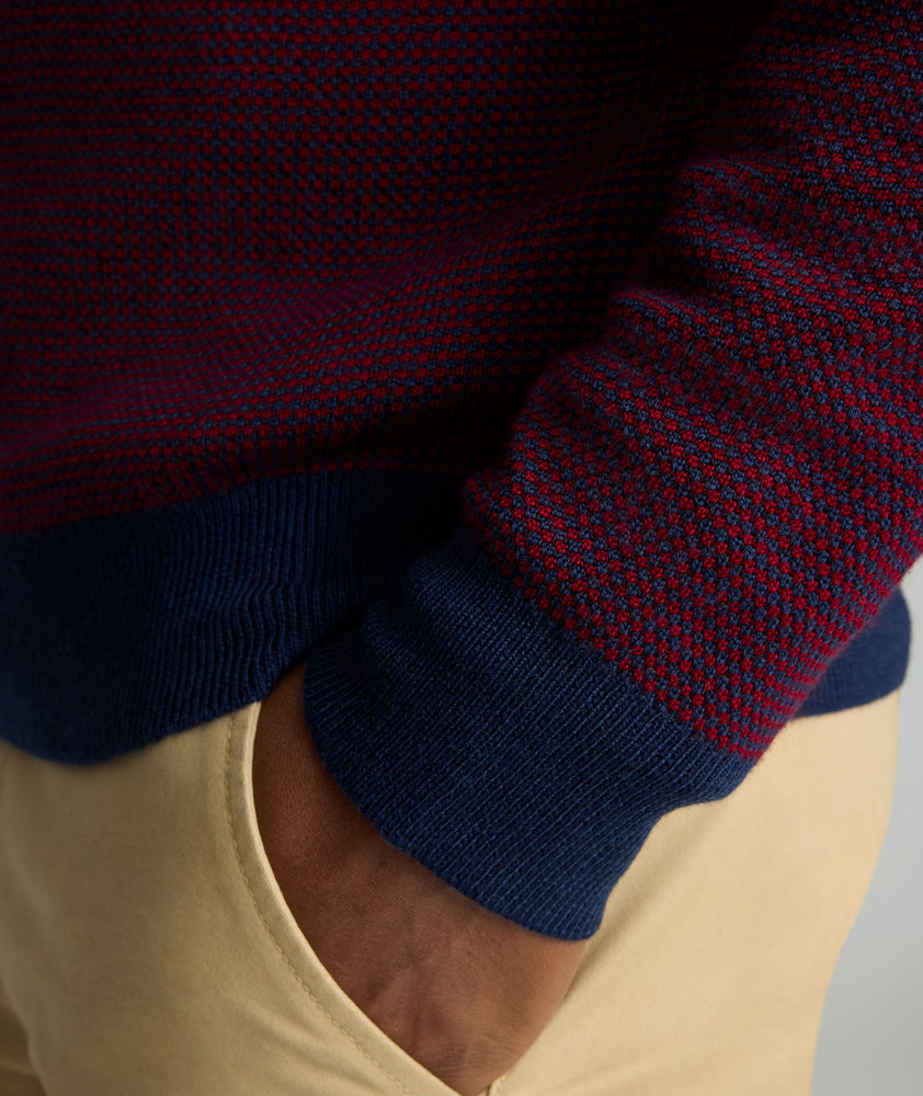 Model is wearing UNTUCKit Textured Merino Wool Quarter-Zips in syrah. 