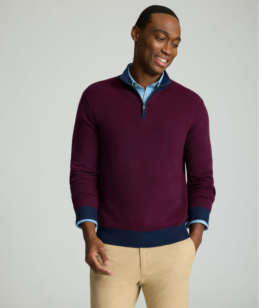 Model is wearing UNTUCKit Textured Merino Wool Quarter-Zips in syrah. 
