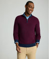 Model is wearing UNTUCKit Textured Merino Wool Quarter-Zips in syrah. 
