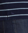 Model wearing an UNTUCKit Dark Blue Striped Indigo Polo.