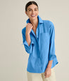 Model is wearing UNTUCKit Melanie shirt in blue. 