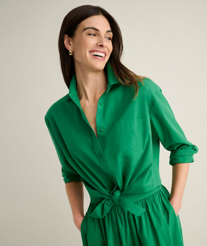 Model is wearing UNTUCKit Melanie shirt in green. 