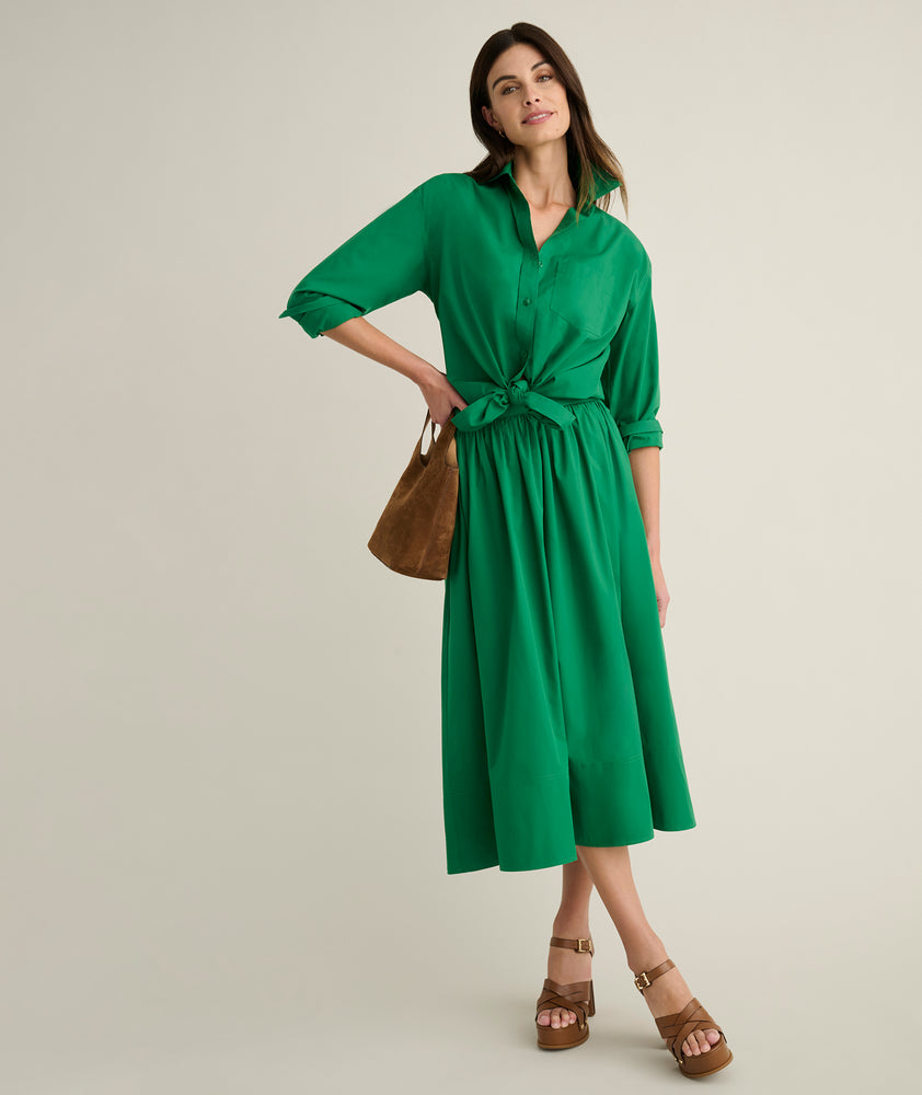 Model is wearing UNTUCKit Melanie shirt in green. 