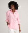 Model is wearing UNTUCKit Wrinkle-Resistant Linen Relaxed Fit Melanie Shirt	Pink. 