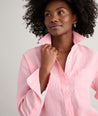 Model is wearing UNTUCKit Wrinkle-Resistant Linen Relaxed Fit Melanie Shirt	Pink. 