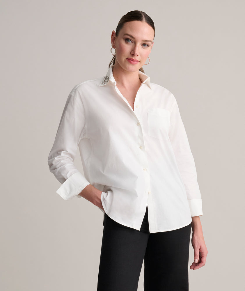 Model is wearing UNTUCKit white shirt. 