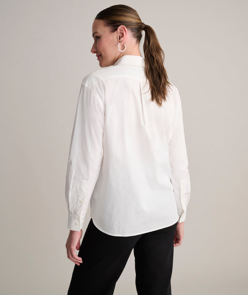 Model is wearing UNTUCKit white shirt. 