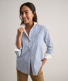 Model is wearing UNTUCKit Cotton Stripe Relaxed Melanie Shirt.