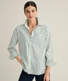 Model is wearing UNTUCKit Melanie in green striped. v