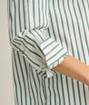 Model is wearing UNTUCKit Melanie in green striped. 