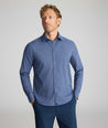Model wearing a blue check UNTUCKit Performance Shirt.