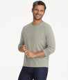 Model is wearing UNTUCKIt Merille long sleeve Tencel Tee in Military Green.