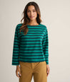 Model is wearing UNTUCKit Cotton Jersey Mille Stripe Tee in green. 