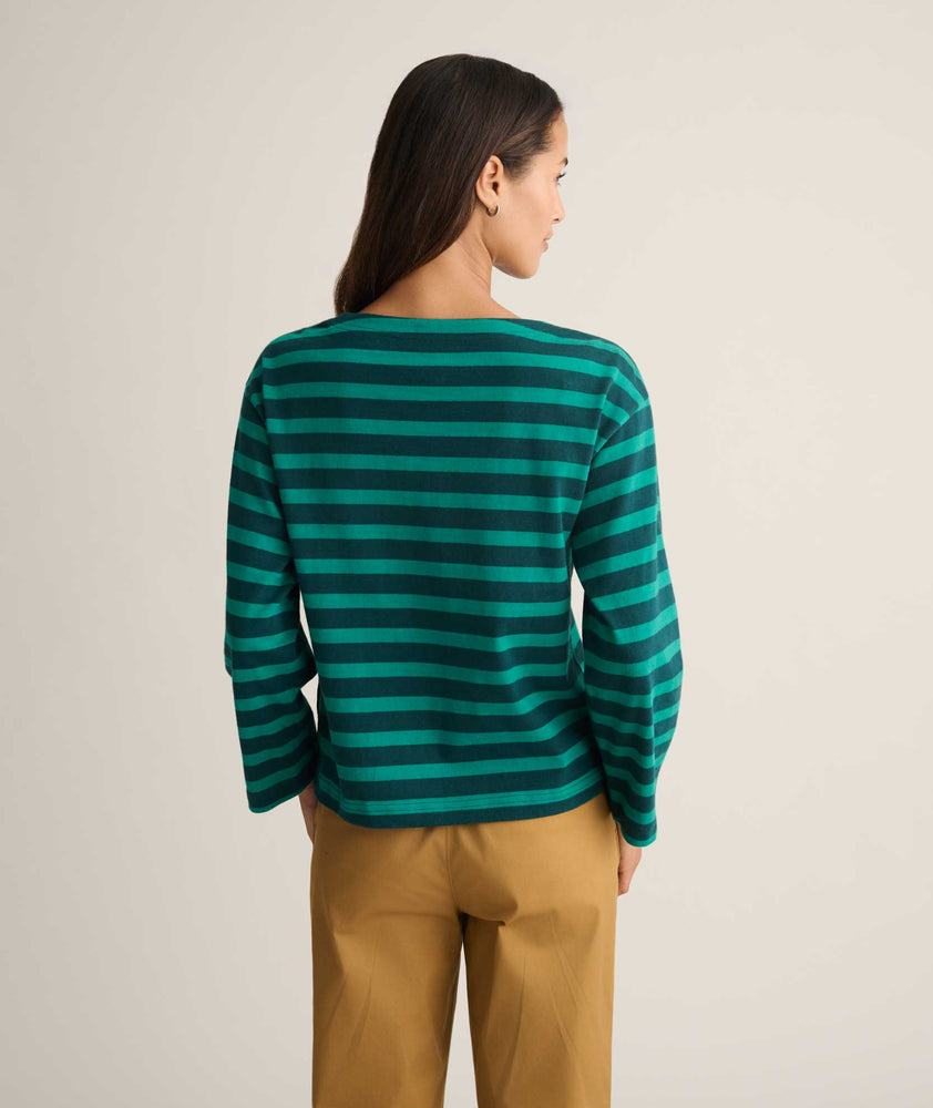 Model is wearing UNTUCKit Cotton Jersey Mille Stripe Tee in green. 
