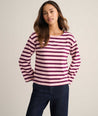 Model is wearing UNTUCKit Cotton Jersey Mille Stripe Tee in pink. 