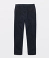 Model is wearing UNTUCKit Stretch Cotton Hybrid Pants in Navy.