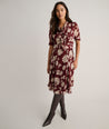 Model is wearing UNTUCKit Floral Necktie Nadine Dress.