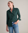 Model is wearing UNTUCKit Natalie top in green.