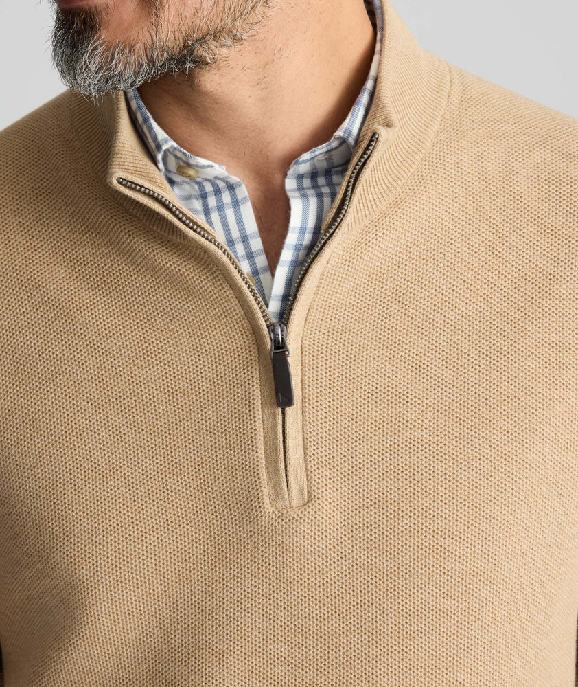 Model is wearing UNTUCKit Cotton Quarter-Zip Sweater in light brown.