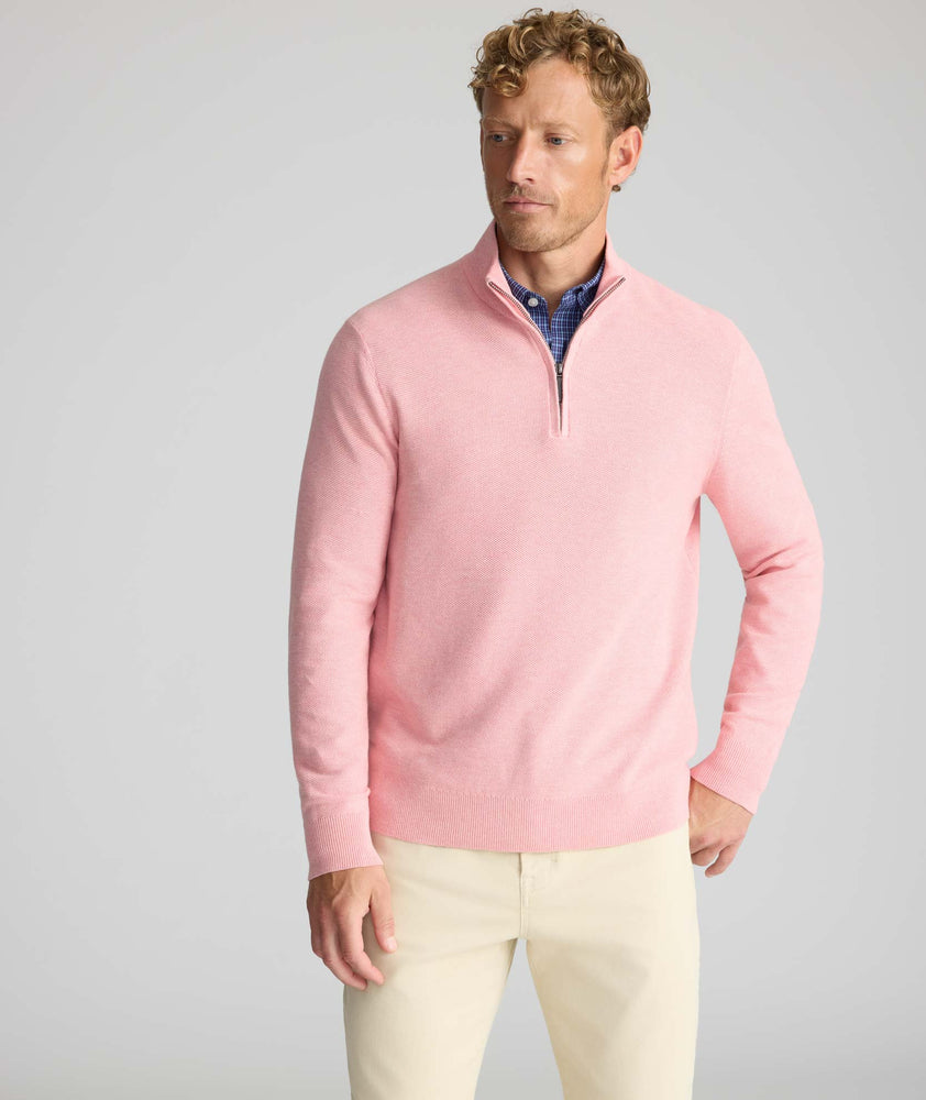 Model is wearing UNTUCKit Cotton Quarter-Zip Sweater in light pink.