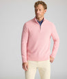 Model is wearing UNTUCKit Cotton Quarter-Zip Sweater in light pink.