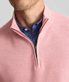 Model is wearing UNTUCKit Cotton Quarter-Zip Sweater in light pink.
