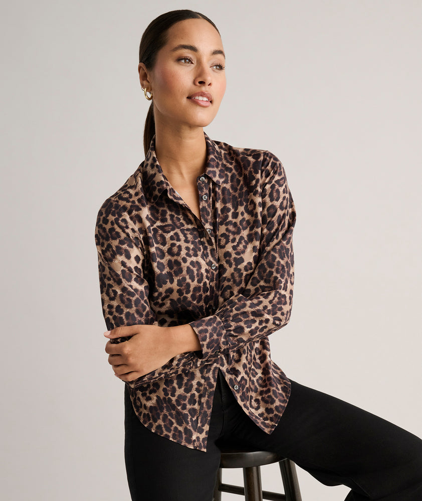 Model is wearing UNTUCKit Leopard Print Odette Shirt.