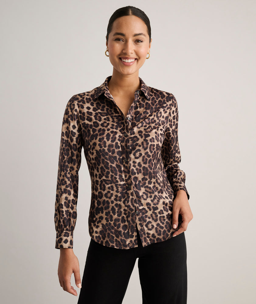 Model is wearing UNTUCKit Leopard Print Odette Shirt.