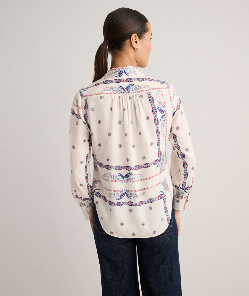 Model is wearing UNTUCKit Bandana Print Odette Shirt.