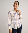 Model is wearing UNTUCKit Bandana Print Odette Shirt.