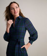 Model is wearing UNTUCKit Paige plaid dress. 