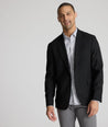Model is wearing UNTUCKit Palazzo sport coat in black.