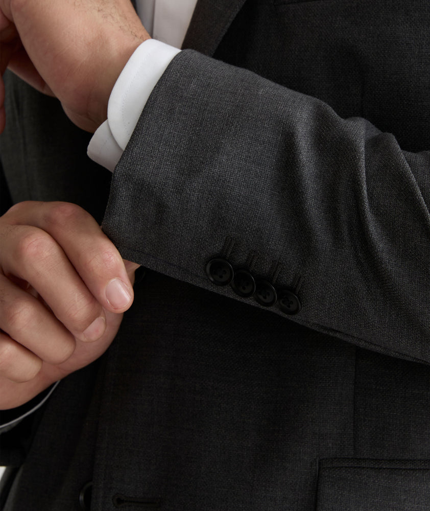 Model wearing an UNTUCKit Grey Wrinkle-Resistant Palazzo Sport Coat.
