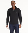 Model is wearing UNTUCKit Snap Fleece Pullover in black.